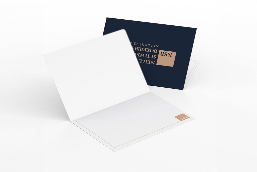 Elegant notecard design with the Neill Schwerin Boxerman, P.C. branding, featuring a minimalist layout with gold accents, highlighting a sophisticated and professional visual identity.