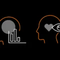 Two heads, side by side. One with data and bar graphs and the other with a heart and eye.